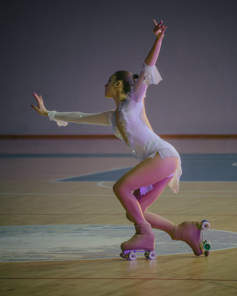 Photo of a female artistic skater during a show.